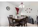 Dining area with a square table, seating for four, and bright natural light at 220 N 22Nd Pl # 2029, Mesa, AZ 85213