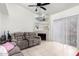 Cozy living room featuring a fireplace, plush seating, and bright natural light at 220 N 22Nd Pl # 2029, Mesa, AZ 85213