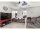 Open living room with neutral tones, comfortable seating, and views to the dining area at 220 N 22Nd Pl # 2029, Mesa, AZ 85213