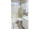 Bathroom equipped with a tiled shower, a white vanity cabinet with storage, and a toilet, designed for convenience at 2221 E Union Hills Dr # 157, Phoenix, AZ 85024