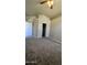 Spacious carpeted bedroom with a closet and neutral paint, ready for personalization at 2221 E Union Hills Dr # 157, Phoenix, AZ 85024