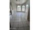 Open dining area with tile flooring and large windows, perfect for Gathering gatherings at 2221 E Union Hills Dr # 157, Phoenix, AZ 85024