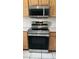 Updated kitchen showcasing stainless steel oven and microwave, complemented by wooden cabinetry at 2221 E Union Hills Dr # 157, Phoenix, AZ 85024