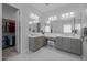 Bathroom featuring dual vanities, a walk-in closet and a separate shower and tub at 22670 E Russet Rd, Queen Creek, AZ 85142