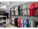 Organized closet with hanging racks and shelving, offering ample storage space for clothing and accessories at 22670 E Russet Rd, Queen Creek, AZ 85142