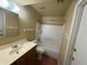 Standard bathroom with a shower-tub combination, single sink vanity, and neutral color scheme at 2328 W Lupine Ave, Phoenix, AZ 85029