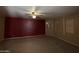 Bedroom features include carpeted floor and accent wall at 2328 W Lupine Ave, Phoenix, AZ 85029