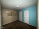 Bedroom featuring neutral paint, carpeted floors and two white doors at 2328 W Lupine Ave, Phoenix, AZ 85029
