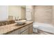 Bathroom with sink and a shower-tub combination at 23829 N 59Th Dr, Glendale, AZ 85310