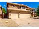 Charming two-story home with a three-car garage and a well-maintained yard with mature landscaping at 23829 N 59Th Dr, Glendale, AZ 85310