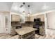 Kitchen with stone countertops, stainless steel appliances, and a center island at 23829 N 59Th Dr, Glendale, AZ 85310