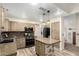 Kitchen featuring an island with stone accents, granite counters, and stainless steel appliances at 23829 N 59Th Dr, Glendale, AZ 85310