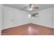 Bedroom featuring wood floors, ceiling fan, and natural light at 2410 N 40Th St, Phoenix, AZ 85008