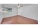 Bedroom featuring wood floors, neutral walls, and ceiling fan at 2410 N 40Th St, Phoenix, AZ 85008