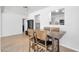 Charming dining area featuring a stylish table and access to the updated kitchen at 2410 N 40Th St, Phoenix, AZ 85008