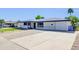 Bright one-story home boasts a convenient garage and freshly painted exterior at 2410 N 40Th St, Phoenix, AZ 85008