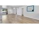 Bright living room featuring sleek wood flooring and modern lighting at 2410 N 40Th St, Phoenix, AZ 85008