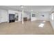 Bright open-concept living room featuring tile floors and recessed lighting at 2410 N 40Th St, Phoenix, AZ 85008
