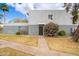 Charming building with a well-manicured lawn and colorful flowering bushes adding curb appeal at 2625 W Ocotillo Rd # 4, Phoenix, AZ 85017