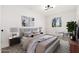 Comfortable main bedroom featuring soft hues, stylish decor, and abundant natural light at 2625 W Ocotillo Rd # 4, Phoenix, AZ 85017