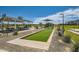 Community recreation area with picnic tables, playground and bocce ball court at 2912 E Lucky Horseshoe Ln, San Tan Valley, AZ 85140