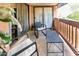 Relaxing balcony area featuring a tile floor, seating area, and a partial view of the outdoors at 3031 N Civic Center Plz # 340, Scottsdale, AZ 85251