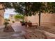 Community grill area with built-in BBQ, picnic table, and cactus garden, perfect for outdoor cooking and gathering at 3031 N Civic Center Plz # 340, Scottsdale, AZ 85251