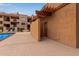 Community pool features lounge chairs and an enclosed recreation area at 3031 N Civic Center Plz # 340, Scottsdale, AZ 85251