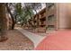 Lush community walkways with benches near attractive apartment buildings at 3031 N Civic Center Plz # 340, Scottsdale, AZ 85251