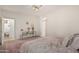 Serene bedroom offers soft rug, neutral tones, and a comfortable, inviting atmosphere at 3080 E Palmdale Ln, Gilbert, AZ 85298