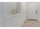 Bright entryway with tiled floor, white walls, and recessed shelving at 3080 E Palmdale Ln, Gilbert, AZ 85298