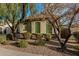Attractive single-story home featuring rock landscaping and a charming desert front yard at 3080 E Palmdale Ln, Gilbert, AZ 85298