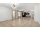 Expansive living room features recessed lighting, tile flooring, and open layout at 3080 E Palmdale Ln, Gilbert, AZ 85298