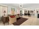 Bright living room features an open floor plan, stylish chandelier, and sophisticated decor at 3080 E Palmdale Ln, Gilbert, AZ 85298