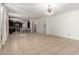 Bright living room showcases stylish pendant lighting and open kitchen access at 3080 E Palmdale Ln, Gilbert, AZ 85298