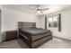 Bedroom with wood-look bed frame, carpet flooring and a bright window at 3144 S Rogers --, Mesa, AZ 85202