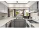 Beautiful kitchen with granite counters, stainless steel appliances, and light grey cabinetry at 3144 S Rogers --, Mesa, AZ 85202