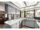 Modern kitchen featuring gray cabinets, stainless steel appliances, and white countertops at 3144 S Rogers --, Mesa, AZ 85202