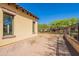 Beautiful backyard with wrought iron fence and view of desert landscaping at 3171 S Hawthorn Ct, Gold Canyon, AZ 85118