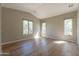 Spacious bedroom with laminate flooring, high ceilings and large windows at 3171 S Hawthorn Ct, Gold Canyon, AZ 85118