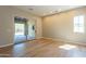 Spacious bedroom with sliding glass doors to the patio and a window for ample natural light at 3171 S Hawthorn Ct, Gold Canyon, AZ 85118