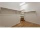 Walk-in closet with white shelving and laminate wood flooring at 3171 S Hawthorn Ct, Gold Canyon, AZ 85118