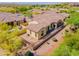 Backyard featuring desert landscaping with a covered patio and fenced in yard at 3171 S Hawthorn Ct, Gold Canyon, AZ 85118