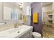 Updated bathroom featuring a modern vanity, tiled shower, and stylish fixtures at 4008 W Citrus Way, Phoenix, AZ 85019
