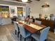 Bright dining room with a table set for six and stylish decor at 4008 W Citrus Way, Phoenix, AZ 85019