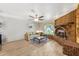 Inviting living room featuring a unique brick fireplace and views of the yard at 4008 W Citrus Way, Phoenix, AZ 85019