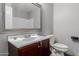 Bathroom with vanity, mirror, and toilet at 41373 W Coltin Way, Maricopa, AZ 85138