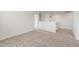 A carpeted hallway features white walls and doors, adding to the home's neutral and modern interior at 5041 S 252Nd Ave, Buckeye, AZ 85326