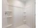 Clean shower stall with built-in shelves for storage, perfect for a refreshing experience at 5041 S 252Nd Ave, Buckeye, AZ 85326