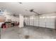 Spacious garage with two bays and ample storage space at 5754 W Larkspur Dr, Glendale, AZ 85304